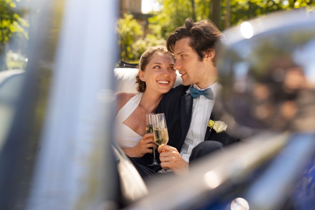 Bride and groom in the car